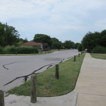 Lake Creek Trail - Looking into the neighborhood street of Braes Valley St - Parks Near Me - Austin, Texas