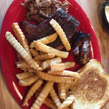 Sonny's BBQ - Wings, brisket, and pulled pork combo with garlic toast and fries - Barbeque Near Me - Richmond, Kentucky Sonny's BBQ - Wings, brisket, and pulled pork combo with garlic toast and fries - Barbeque Near Me - Richmond, Kentucky