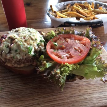Game - Venison burger with Gorgonzola, duck fat fries in the back - Burgers Near Me - Louisville, Kentucky Game - Venison burger with Gorgonzola, duck fat fries in the back - Burgers Near Me - Louisville, Kentucky