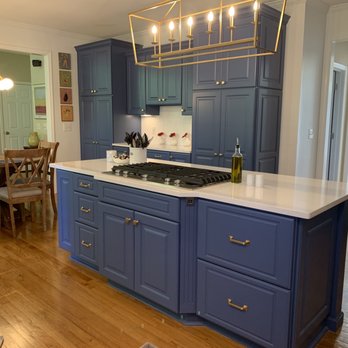 Affinity Stoneworks - a kitchen with blue cabinets and white countertops - General Contractors Near Me - Alpharetta, Georgia Affinity Stoneworks - a kitchen with blue cabinets and white countertops - General Contractors Near Me - Alpharetta, Georgia