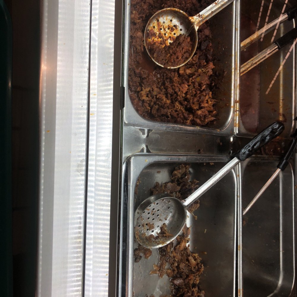 two serving trays of food