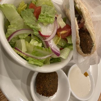 Rothchild's Kitchen - Falafel in pita with side salad and extra falafel (cute touch) - Mediterranean Near Me - Great Neck, New York Rothchild's Kitchen - Falafel in pita with side salad and extra falafel (cute touch) - Mediterranean Near Me - Great Neck, New York