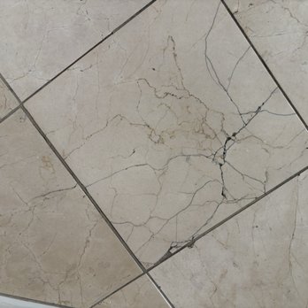 Marco Beach Ocean Suites - Cracked tile - Hotels Near Me - Marco Island, Florida Marco Beach Ocean Suites - Cracked tile - Hotels Near Me - Marco Island, Florida