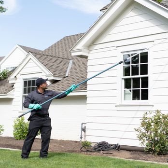 Hawx Pest Control - Hawx technician brushes away spider webs and debris from the home exterior, keeping it clean and pest-free. - Pest Control Near Me - Raleigh, North Carolina Hawx Pest Control - Hawx technician brushes away spider webs and debris from the home exterior, keeping it clean and pest-free. - Pest Control Near Me - Raleigh, North Carolina