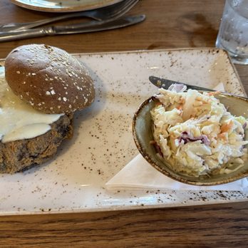 The Waterfront Restaurant - Almond lightly fried portobello sandwich on a multigrain bun with a side of pineapple Cole slaw - Seafood Near Me - Anna Maria, Florida The Waterfront Restaurant - Almond lightly fried portobello sandwich on a multigrain bun with a side of pineapple Cole slaw - Seafood Near Me - Anna Maria, Florida