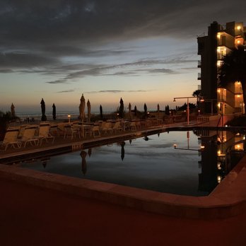 Shoreline Island Resort - Pool area right after sunset. - Hotels Near Me - Madeira Beach, Florida Shoreline Island Resort - Pool area right after sunset. - Hotels Near Me - Madeira Beach, Florida