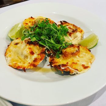 Geronimo’s - Conchas a la Parmesana  Scallops in the 1/2 shell with melted mozzarella, Parmesan cheese, and touch of lime. - Peruvian Near Me - Ambler, Pennsylvania