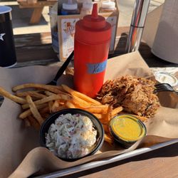 Mission BBQ - BBQ food with coleslaw, fries, and pulled pork.