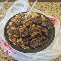Golden Krust - The braised oxtail w peas and rice is out of this world delicious