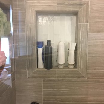 American Decorating Outlet - a bathroom with a shower - Interior Design Near Me - Sarasota, Florida American Decorating Outlet - a bathroom with a shower - Interior Design Near Me - Sarasota, Florida