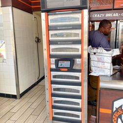 Little Caesars - The online order pickup tower is HOT and I don't just mean the temperature of the pizzas in it if you get my drift. (Also the wings)