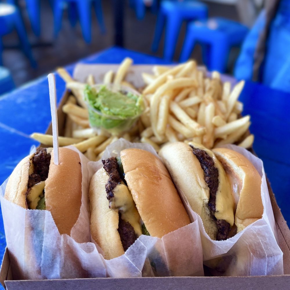 The Station - Back alley burgers (one with no onions) and fries with a side of avocado - Burgers Near Me - Berkeley, California The Station - Back alley burgers (one with no onions) and fries with a side of avocado - Burgers Near Me - Berkeley, California
