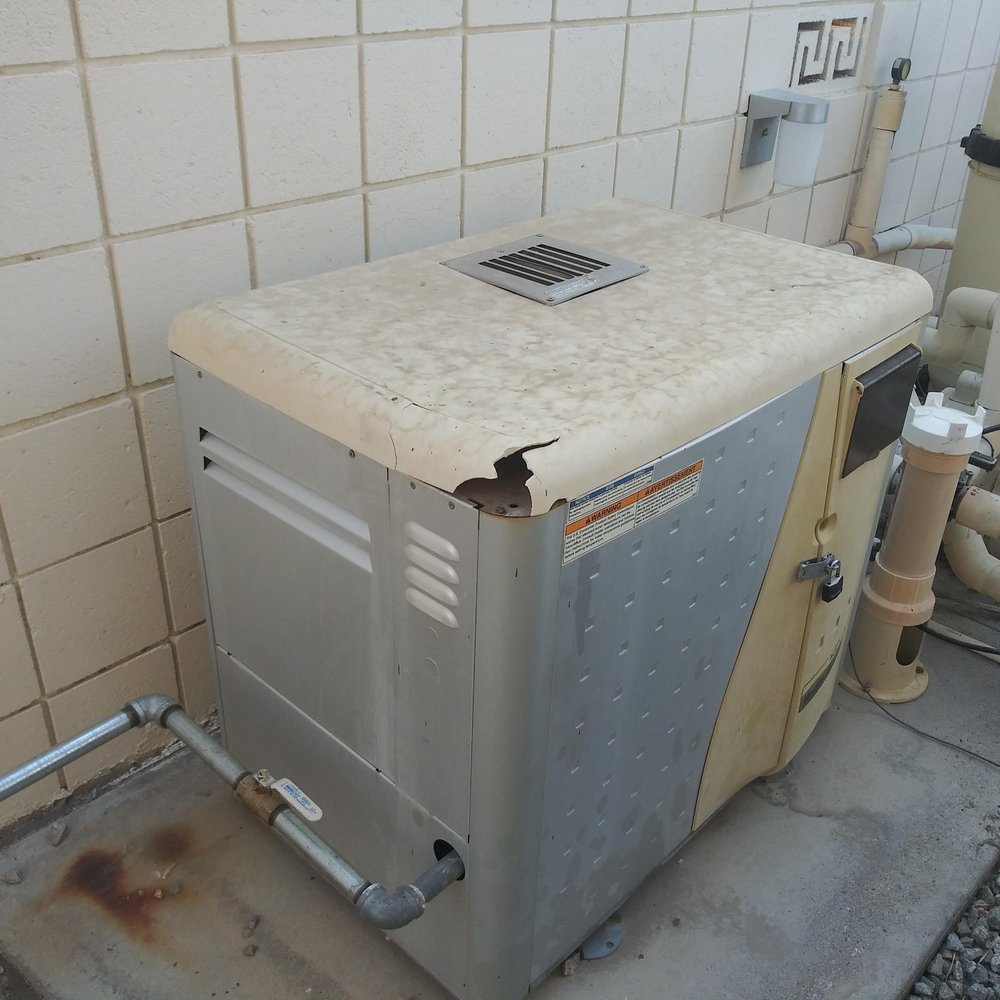 Maui Pool Service - During the diagnosis, the technician from Maui Pool Service forced the lid of the heater off. You can see the missing chunk in this photo. - Swimming Pools Near Me Maui Pool Service - During the diagnosis, the technician from Maui Pool Service forced the lid of the heater off. You can see the missing chunk in this photo. - Swimming Pools Near Me