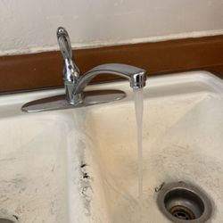 Boardwalk Realty & Management - Kitchen sink at move in.