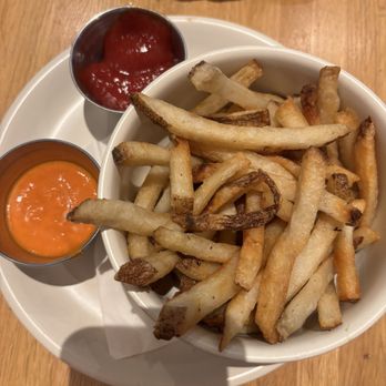 True Food Kitchen - Air-fryer French fries with peri peri sauce and ketchup - New American Near Me - Chicago, Illinois True Food Kitchen - Air-fryer French fries with peri peri sauce and ketchup - New American Near Me - Chicago, Illinois