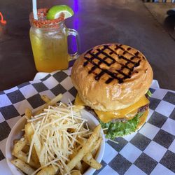 The Lodge Sports Bar & Grill - Today I tried the 50-50 burger.. OMG!! Yes!! And Parmesan fries.