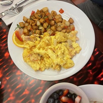 Michael Patrick's Brasserie - a plate of scrambled eggs and fruit - American Near Me - Atlantic City, New Jersey Michael Patrick's Brasserie - a plate of scrambled eggs and fruit - American Near Me - Atlantic City, New Jersey