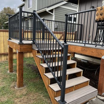 Gustafson Interiors - Added onto the deck framing as well as steps, Trex decking and railings. - General Contractors Near Me Gustafson Interiors - Added onto the deck framing as well as steps, Trex decking and railings. - General Contractors Near Me