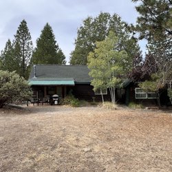 Yosemite Hilltop Cabins - view looking at front patio of sage cabin
