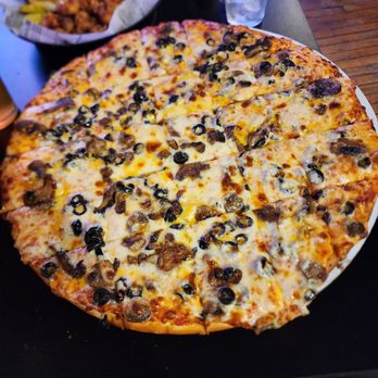 The Big Dipper - Mushroom and Black Olive Pizza - Sports Bars Near Me - Park Falls, Wisconsin