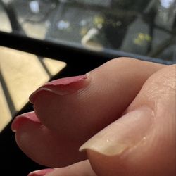 Palazzo Nails - Gel manicure began popping off in solid piece one after another only after 2 days.