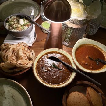 Chatti by Regi Mathew - Mutton biriyani, black chickpea curry, chicken curry, paratha, Malabar fried bread - Indian Near Me - New York, New York