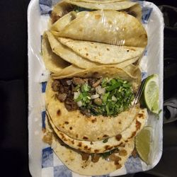 Taqueria Sabrozona - Beef and chicken tacos with cilantro and onions