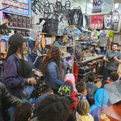 Bolt Bike Shop - Bolt Bike shop manager giving our students and their families a tour of the store, wheel parts and definition plus a wheel repair demonstrat