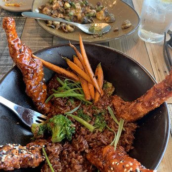 Sixty Six Acres - Korean chicken bowl and crispy Brussel sprouts - Cocktail Bars Near Me - Albuquerque, New Mexico Sixty Six Acres - Korean chicken bowl and crispy Brussel sprouts - Cocktail Bars Near Me - Albuquerque, New Mexico