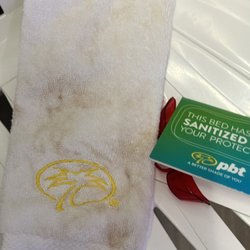 Palm Beach Tan - Dirty towels. Holes in the walls