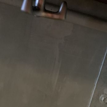 George Coffee & Pastries - Coat hooks under chalk board seating - Bakeries Near Me - Seattle, Washington