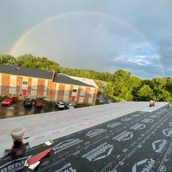 Anariba - a rainbow in the sky over a roof - Roofing Near Me Anariba - a rainbow in the sky over a roof - Roofing Near Me