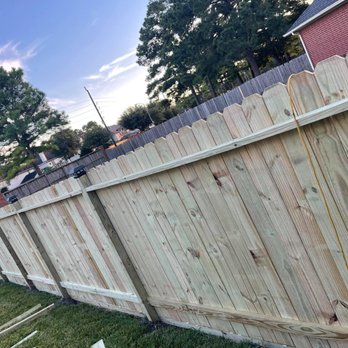 Exclusive Landscaping & Construction - a fence being built - Lawn Services Near Me Exclusive Landscaping & Construction - a fence being built - Lawn Services Near Me