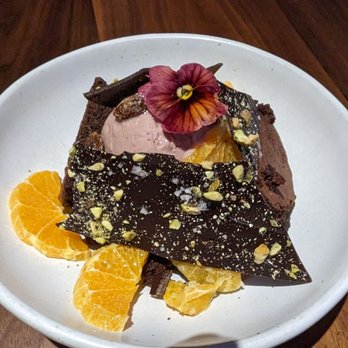Frances - DARK CHOCOLATE brownie, pistachio bark, citrus, pomegranate honey ice cream   12 - New American Near Me - San Francisco, California