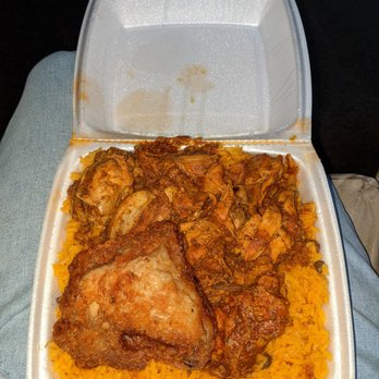 Los Amigos Market - Stew chicken with one piece of fried chicken on a bed of rice - Latin American Near Me - Lowell, Massachusetts Los Amigos Market - Stew chicken with one piece of fried chicken on a bed of rice - Latin American Near Me - Lowell, Massachusetts