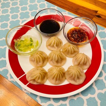 Xiao Chi Jie - Soup dumplings with the Trio of Sauces. I combined all the sauces in one bowl, perfect with the dumplings! - Shanghainese Near Me - Bellevue, Washington Xiao Chi Jie - Soup dumplings with the Trio of Sauces. I combined all the sauces in one bowl, perfect with the dumplings! - Shanghainese Near Me - Bellevue, Washington