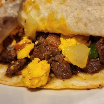 Canela Cafe - A look inside the steak breakfast quesadilla special - Breakfast & Brunch Near Me - Milwaukee, Wisconsin