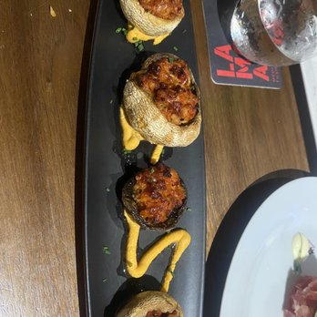 Lamoraga - Chorizo stuffed mushrooms.  Wouldn't you expect a better presentation at a restaurant like this? - Spanish Near Me - Naples, Florida