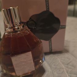 Elegance Perfumes - Dark ugly bottle of flowerbomb