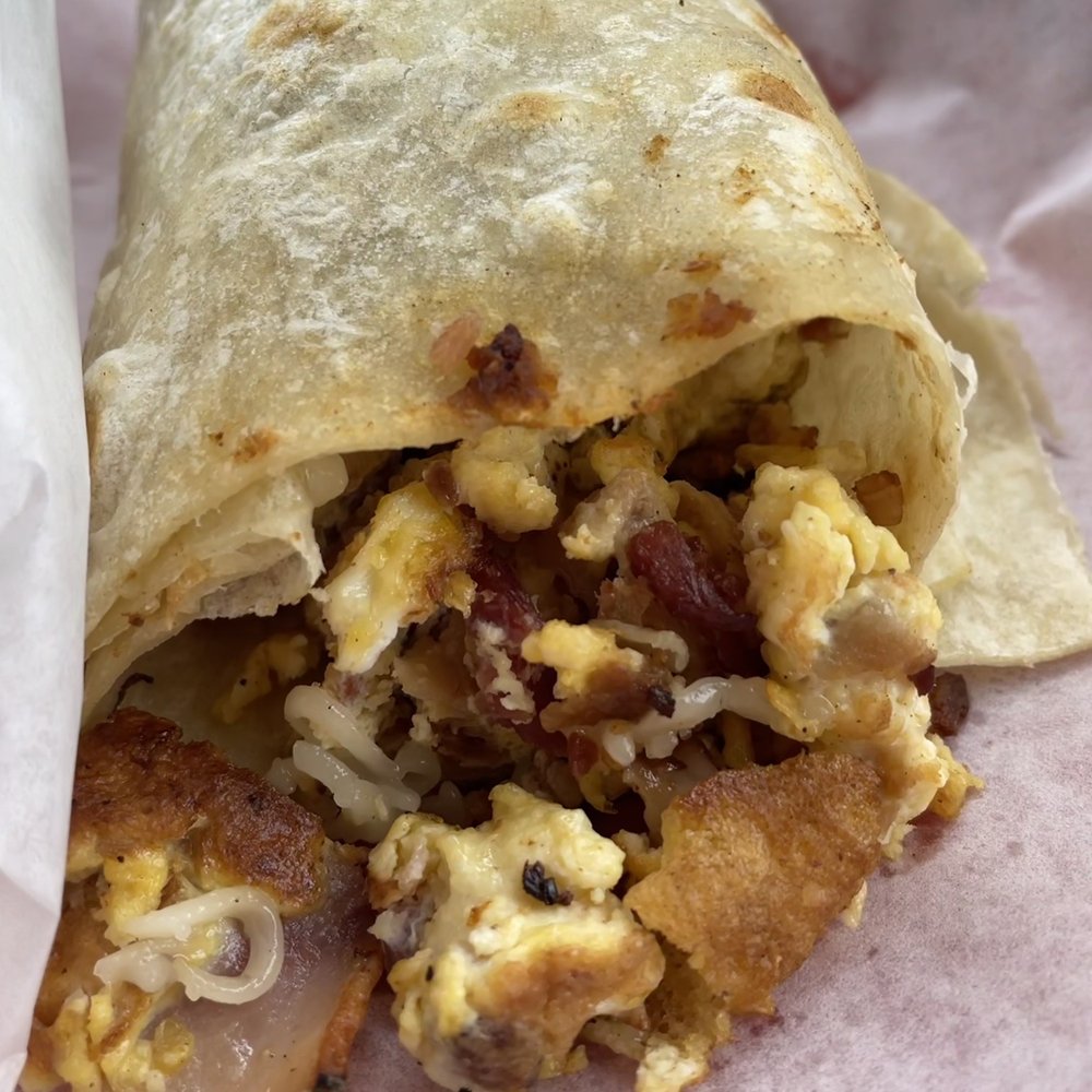 Vega Caffe Mexican Deli - Breakfast burrito-- my half, we shared it. D-lish! - Delis Near Me - Chula Vista, California Vega Caffe Mexican Deli - Breakfast burrito-- my half, we shared it. D-lish! - Delis Near Me - Chula Vista, California