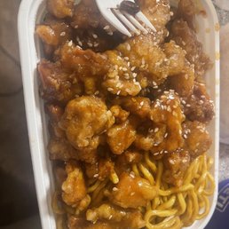 a bowl of noodles and chicken