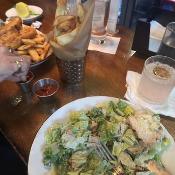 Kirwan's On The Wharf - Caesar salad with chicken and side of fries. Paloma cocktail. Fish and chips. - Irish Pub Near Me - Washington, DC, District of Columbia Kirwan's On The Wharf - Caesar salad with chicken and side of fries. Paloma cocktail. Fish and chips. - Irish Pub Near Me - Washington, DC, District of Columbia