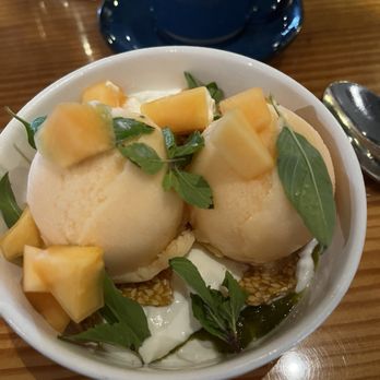 Odd Duck - Melon Sorbet Sundae, coconut rice pudding, cucumber-jalapeño jelly, sesame brittle - American Near Me - Austin, Texas Odd Duck - Melon Sorbet Sundae, coconut rice pudding, cucumber-jalapeño jelly, sesame brittle - American Near Me - Austin, Texas