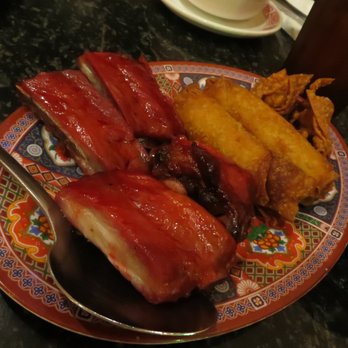 Happy Lamp - a plate of food on a table - Chinese Near Me - Houston, Texas