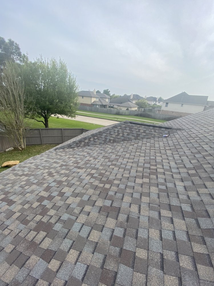 Slide of Big Randys Roofing