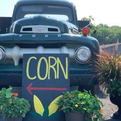 Truck with corn sign