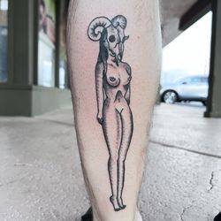 American Vintage Tattoo - Traditional pinup with ram skull tattoo by Braeden Page