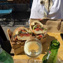 One of a kind sandwich at a fun spot in Siracusa!  Cold bread and wine, lively atmosphere, quick, helpful service!