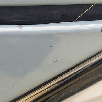 M Toguchi Body Shop - Repeat photo of paint chip. Plus more sticky gunk. - Body Shops Near Me - Wailuku, Hawaii