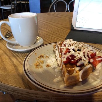 Funk 'n Waffles - Waffle (1/2) with strawberries, and their own version of an earl grey tea latte called Purple Haze - New American Near Me - Syracuse, New York